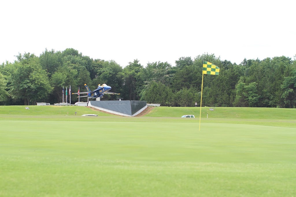 Panoramic view of a lush green golf course at Smyrna Golf Course. Smooth