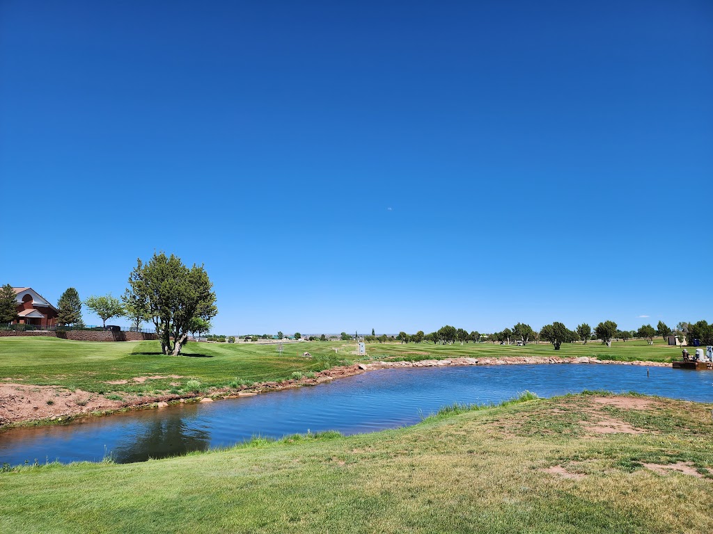 Panoramic view of a lush green golf course at Snowflake Municipal Golf. Smooth
