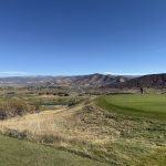 Panoramic view of a lush green golf course at Soldier Hollow Golf Course. Smooth