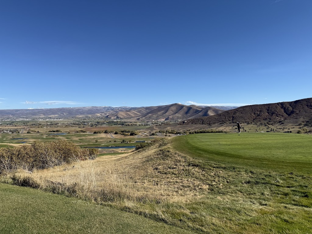Panoramic view of a lush green golf course at Soldier Hollow Golf Course. Smooth