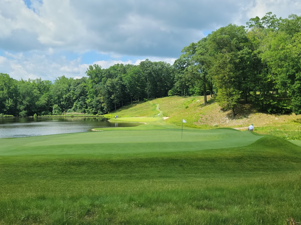 Panoramic view of a lush green golf course at Somerset Hills Country Club. Smooth