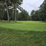 Panoramic view of a lush green golf course at Souhegan Woods Golf Club. Smooth