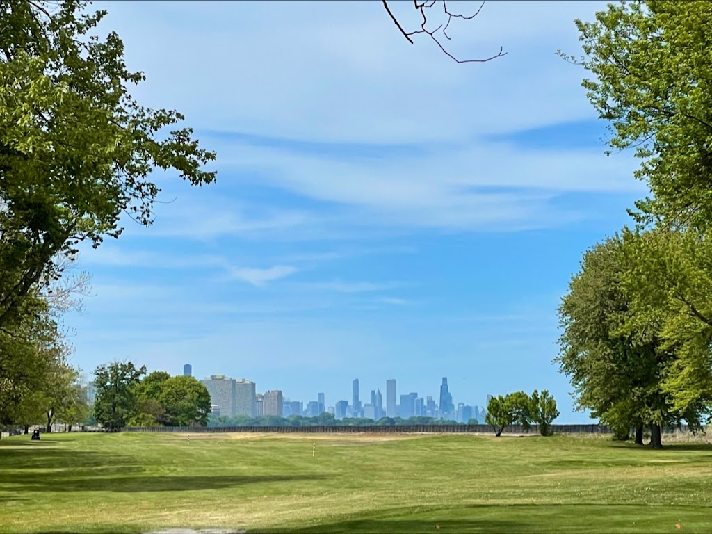 Panoramic view of a lush green golf course at South Shore Golf Course. Smooth