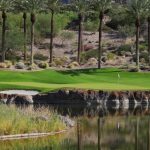 green grass with the flag in the hole.