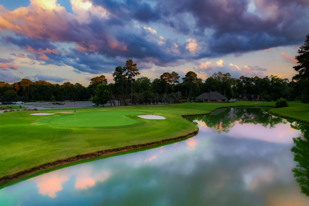 Panoramic view of a lush green golf course at Southern Landings Golf Club. Smooth