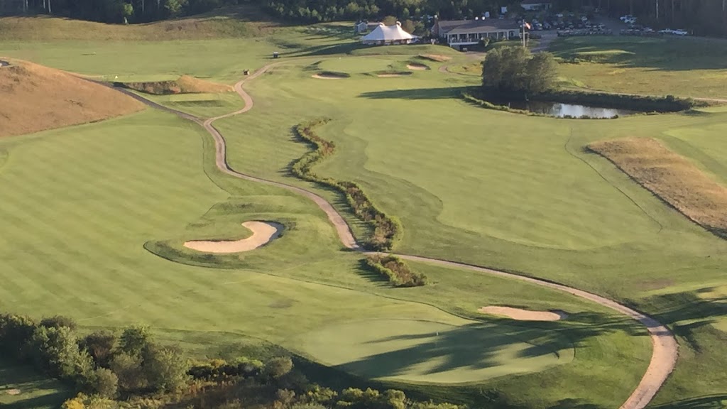 Panoramic view of a lush green golf course at Southers Marsh Golf Club. Smooth