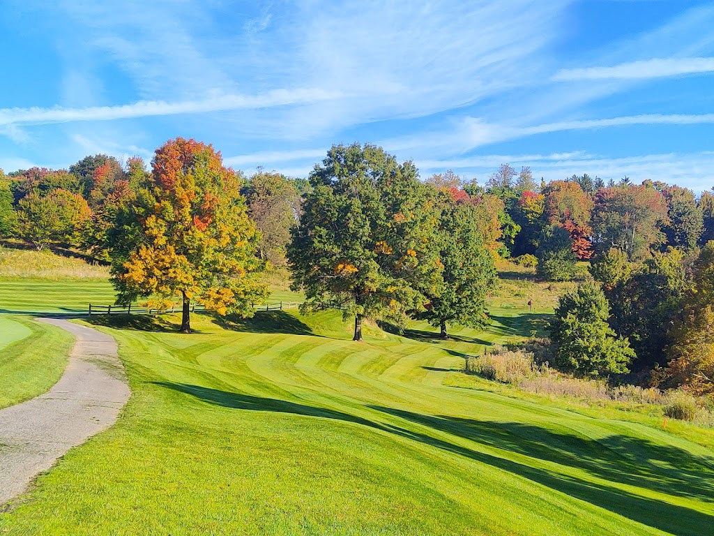 Panoramic view of a lush green golf course at Speidel Golf Club at Oglebay. Smooth