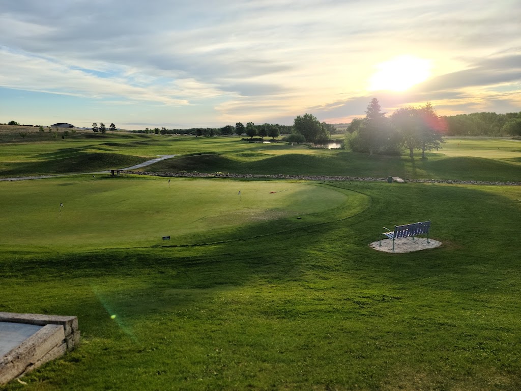 Panoramic view of a lush green golf course at Spring Valley Golf Club. Smooth