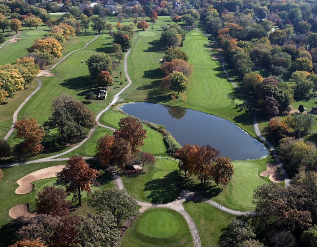 Panoramic view of a lush green golf course at St. Andrews Golf and Country Club. Smooth