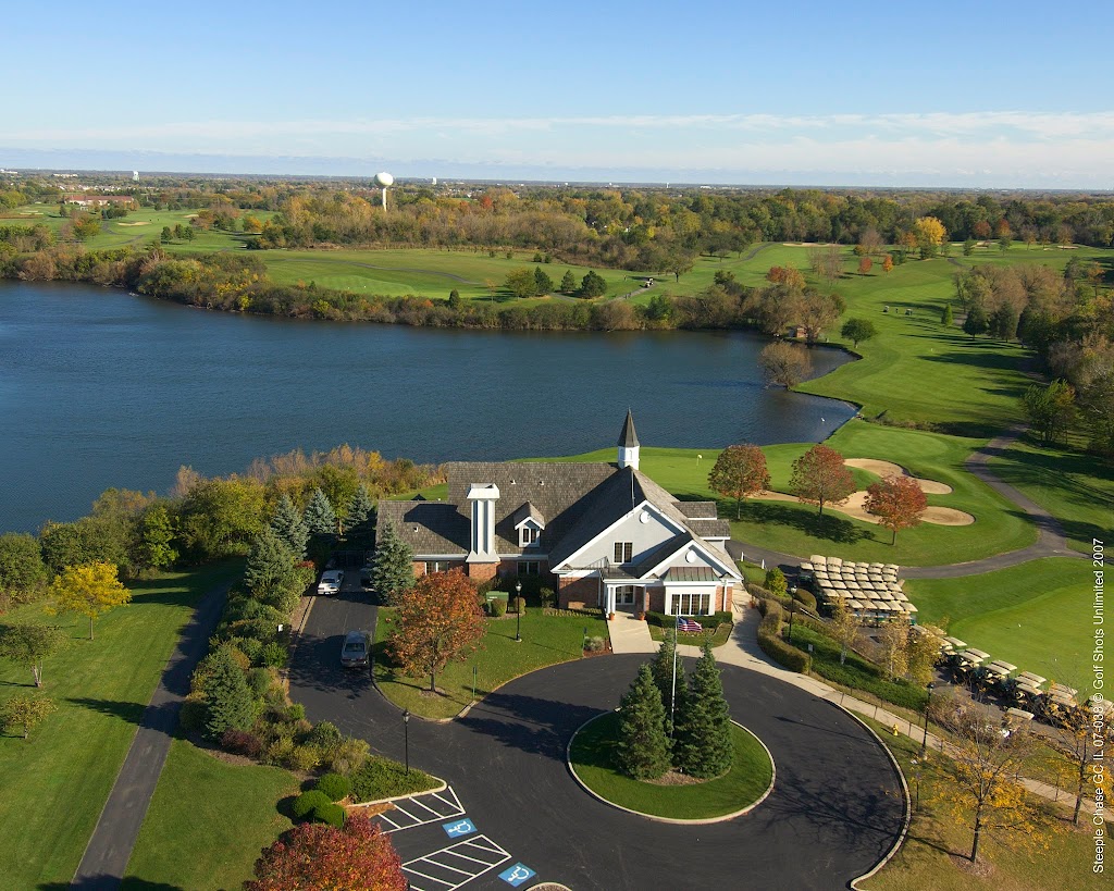Panoramic view of a lush green golf course at Steeple Chase Golf Club. Smooth