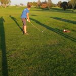 Panoramic view of a lush green golf course at Steepleview Golf Course. Smooth