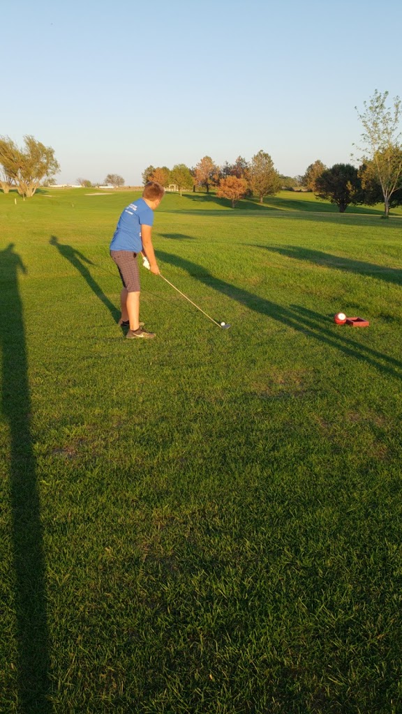 Panoramic view of a lush green golf course at Steepleview Golf Course. Smooth