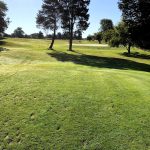 Panoramic view of a lush green golf course at Sterling Park Golf Club. Smooth