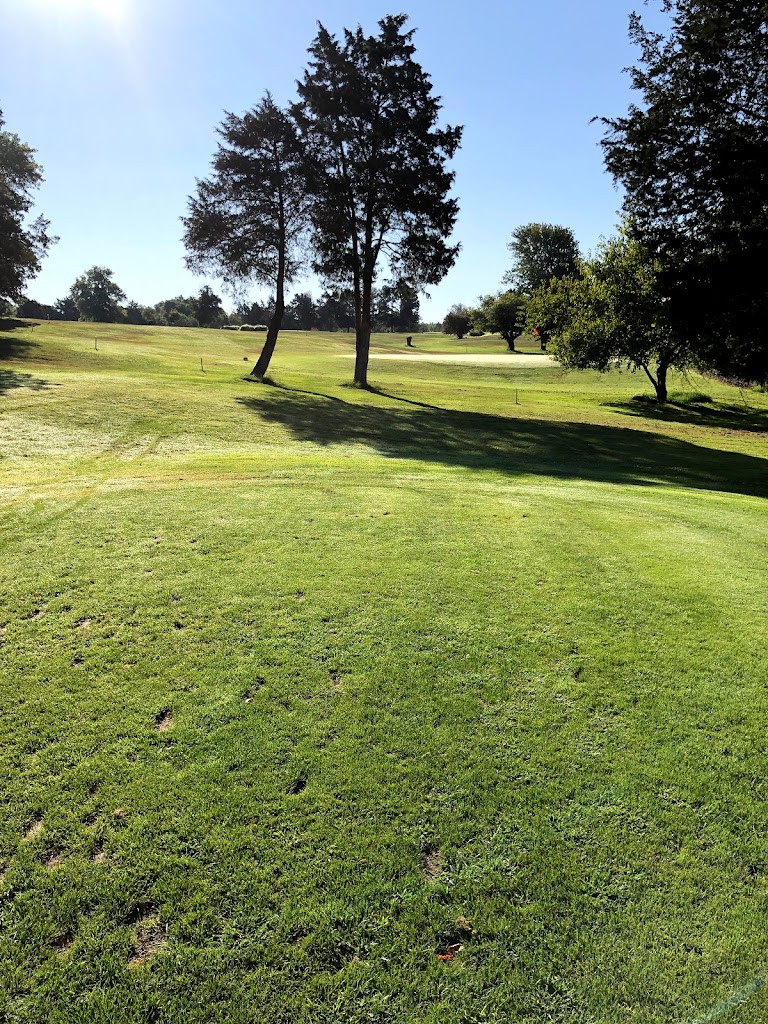 Panoramic view of a lush green golf course at Sterling Park Golf Club. Smooth