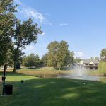 Panoramic view of a lush green golf course at Steve Hogan Golf Course. Smooth