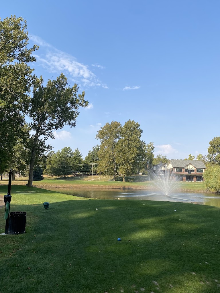 Panoramic view of a lush green golf course at Steve Hogan Golf Course. Smooth