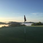 Panoramic view of a lush green golf course at StoneCrest Golf Course. Smooth