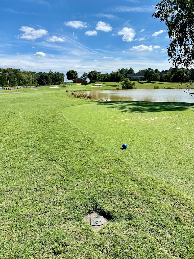 Panoramic view of a lush green golf course at Stonebridge Golf Club. Smooth