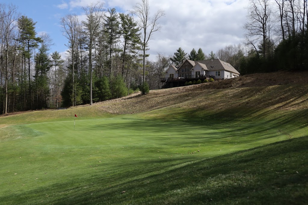 Panoramic view of a lush green golf course at Stonehaven Golf Course (Glade Springs Village POA). Smooth