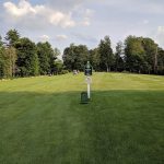 Panoramic view of a lush green golf course at Stonehedge Golf and FootGolf Course. Smooth