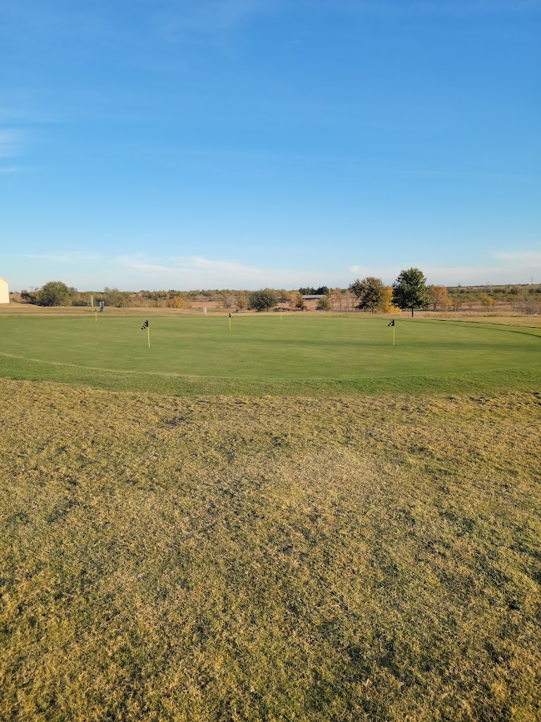 Panoramic view of a lush green golf course at Stoney Ridge Golf Course. Smooth