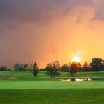 Panoramic view of a lush green golf course at Stonycreek Golf Club. Smooth