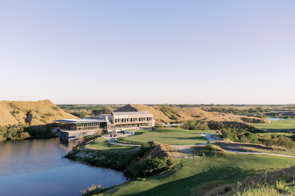 Panoramic view of a lush green golf course at Streamsong Golf Resort. Smooth
