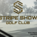 Panoramic view of a lush green golf course at Stripe Show Golf Club. Smooth