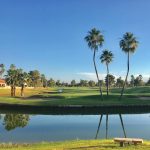 Panoramic view of a lush green golf course at Sunbird Golf Club. Smooth
