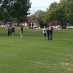 Panoramic view of a lush green golf course at Sunrise Pointe Golf Course. Smooth