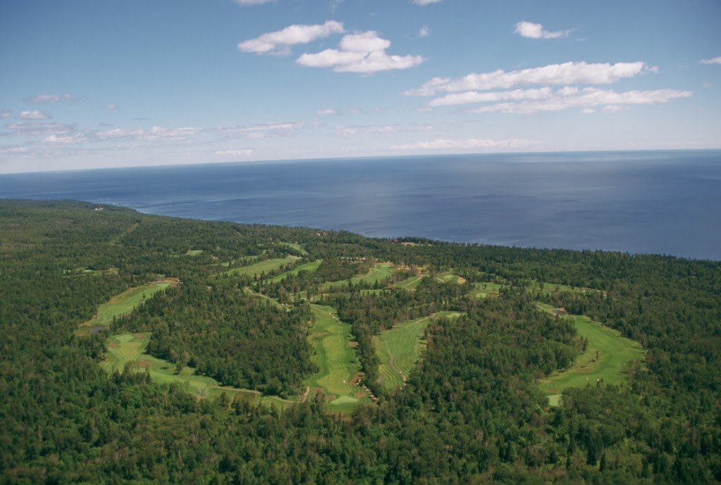 Panoramic view of a lush green golf course at Superior National at Lutsen-Golf Course. Smooth