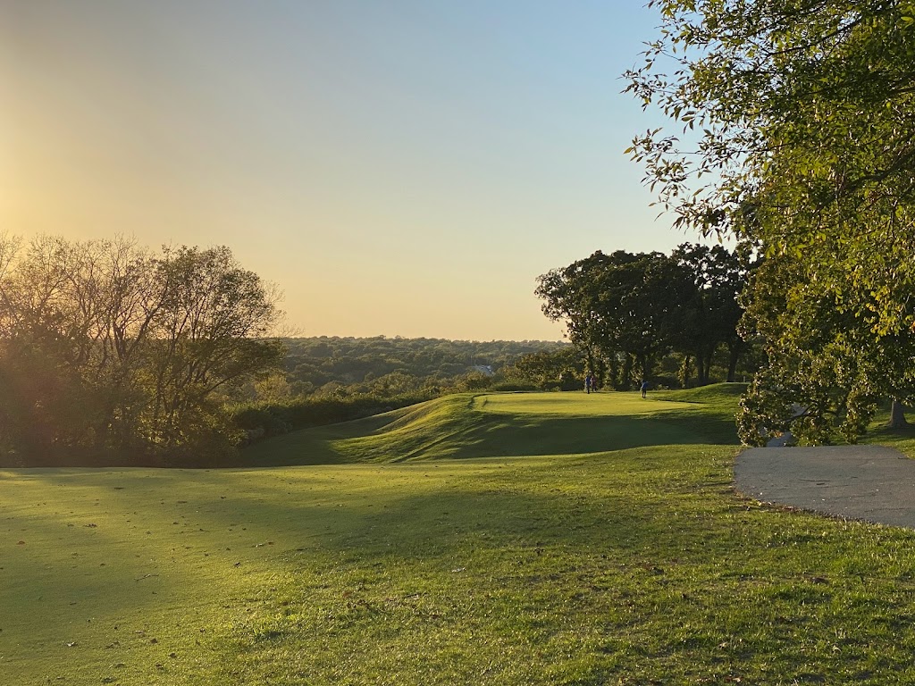 Panoramic view of a lush green golf course at Swope Memorial Golf Course. Smooth