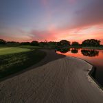 Panoramic view of a lush green golf course at TPC Prestancia. Smooth
