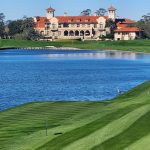 green grass with the flag in the hole.