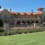 Panoramic view of a lush green golf course at TPC Sawgrass. Smooth