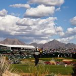 Panoramic view of a lush green golf course at TPC Scottsdale. Smooth