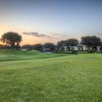 Panoramic view of a lush green golf course at TPC Tampa Bay. Smooth