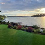 Panoramic view of a lush green golf course at Tacoma Country & Golf Club. Smooth