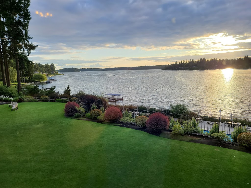 Panoramic view of a lush green golf course at Tacoma Country & Golf Club. Smooth