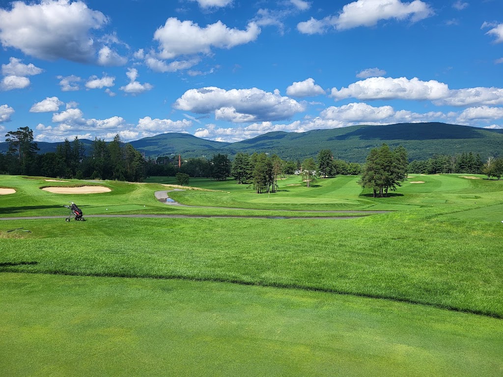 Panoramic view of a lush green golf course at Taconic Golf Club. Smooth