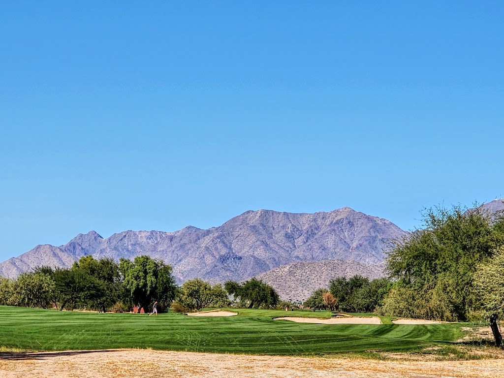 Panoramic view of a lush green golf course at Talking Stick Golf Club. Smooth