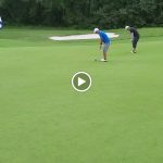 green grass with the flag in the hole.