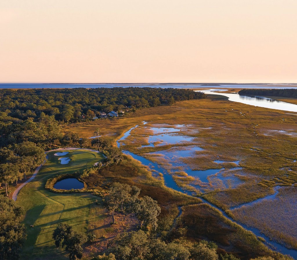Panoramic view of a lush green golf course at Terrapin Point Golf Course at The Landings Golf & Athletic Club. Smooth