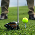 green grass with the flag in the hole.