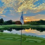 Panoramic view of a lush green golf course at Texas 9 Golf. Smooth