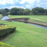 Panoramic view of a lush green golf course at Texas Star Golf Course. Smooth