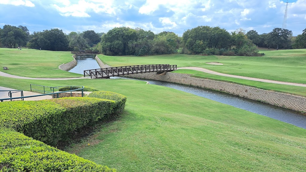 Panoramic view of a lush green golf course at Texas Star Golf Course. Smooth