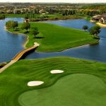 Panoramic view of a lush green golf course at The Club at Eaglebrooke. Smooth