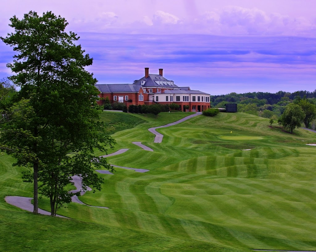 Panoramic view of a lush green golf course at The Club at Glenmore. Smooth
