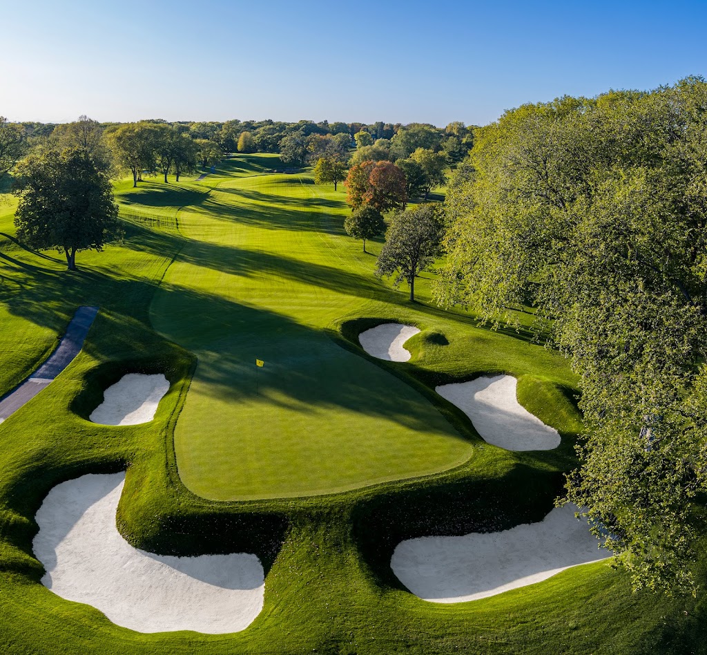 Panoramic view of a lush green golf course at The Club at Golden Valley. Smooth